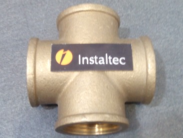 Cruz latón H 1/2"